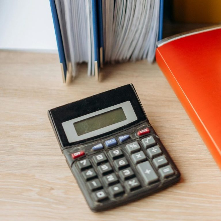 An assortment of pills and tablets on a white surface